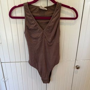 richer poorer bodysuit.